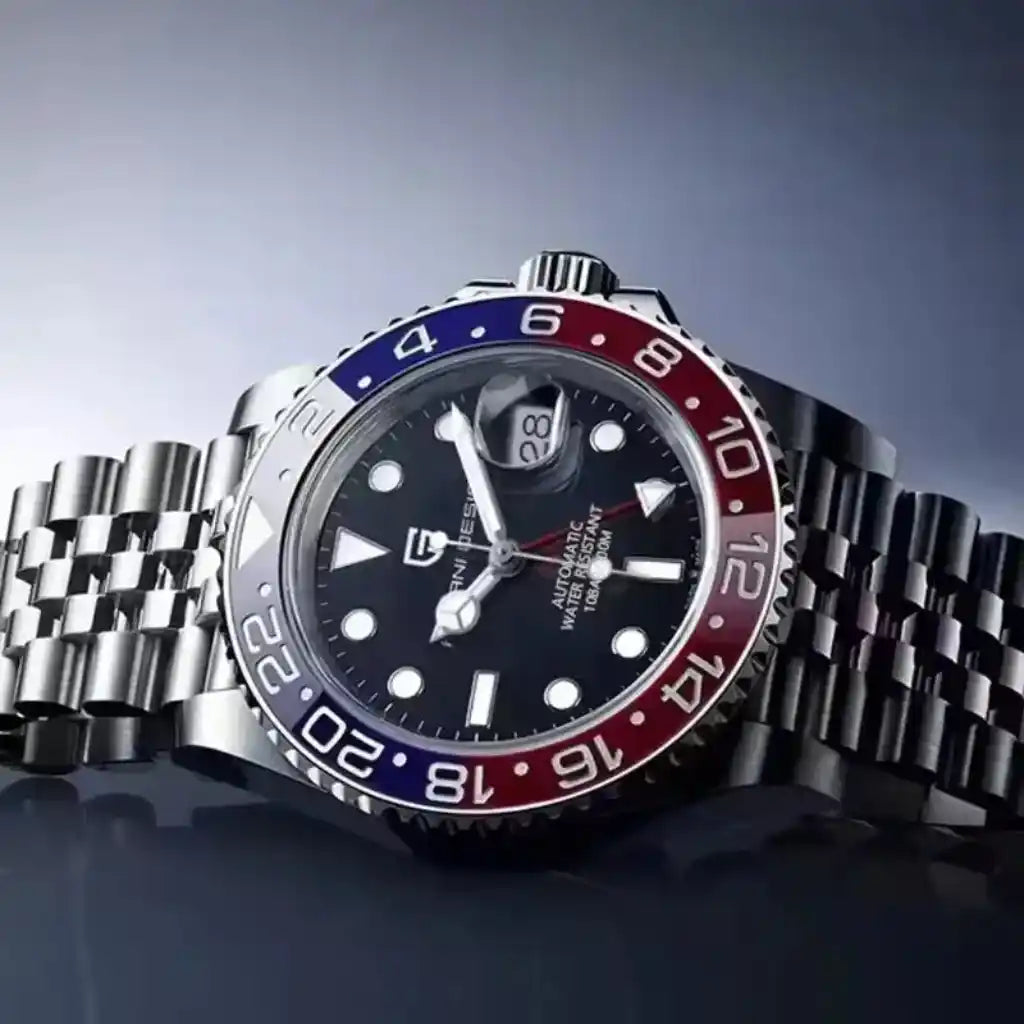 Relógio Automático Masculino Kronos Blue Red em vista lateral evidenciando o acabamento em aço polido e o bezel cerâmico vermelho rotativo